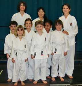 (Click to Enlarge) Sensei Shahinaz Pelter & Patrick Pelter with some of   Bromley & South East London JKA  Club new members: Alexander, Lily, Nikki, Tom, Charlotte, Clara & Nicola.