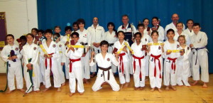 (Please Click to Enlarge) Wednesday 3rd December 2014. Examiners Sensei Martin Dobson (4th Dan) & Sensei Tony Cronk (3rd Dan) with Sensei Shahinaz Pelter, Patrick Pelter & some of Bromley & South East London JKA Karate Club students after the club's very succssessful grading with a 100% pass rate ! Many thanks to Sensei Martin & Sensei Tony. Well Done & Congratulations to Everyone! & Keep Training!
