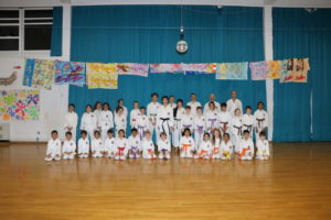 (Click to Enlarge) Xin with Sensei Shahinaz & Sensei Patrick surrounded by many members from Bromley & South East London JKA Karate Club. Many Congratulations Xin!!!