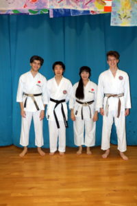 (Click to Enlarge) Xin wearing his Black belt for the first time with Sensei Patrick, Sensei Shahinaz & William. Well deserved Xin!!!