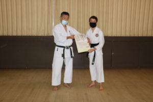 Samuel Receiving His Well Earned Sho Dan (Black Belt) Diploma! Many Congratulations!!!!
