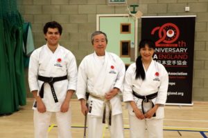 Sensei Shahinaz & Sensei Patrick with Sensei Sawada, 7th Dan, at the JKA England Spring International  Course at Crawley, 2023!